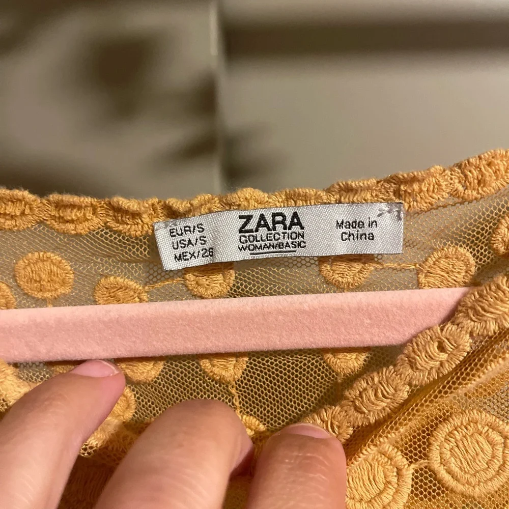 Chic Yellow Lace Blouse with Intricate Floral Patterns - Picture 6 of 6